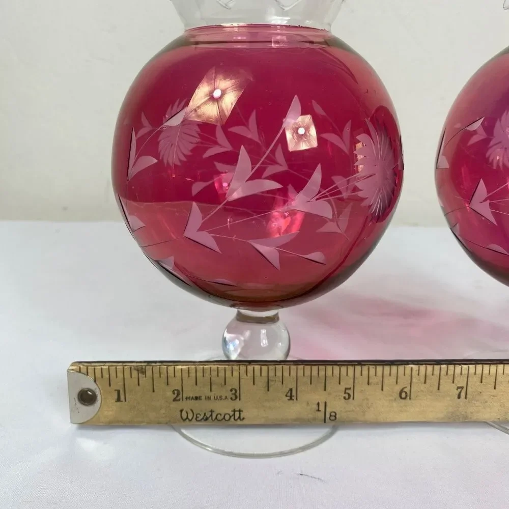 2 Vtg  cranberry round vases 2 w/etched flowers on a base. 50s 60s
